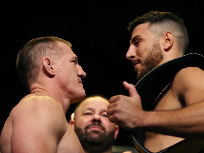 NEWCASTLE, AUSTRALIA - MAY 10: Paul Gallen faces off with opponent Kris Terzievski during the King of the Castle Official Weigh-In at Civic Theatre on May 10, 2022, in Newcastle, Australia. (Photo by Peter Lorimer/Getty Images)