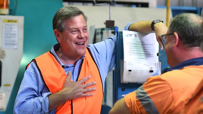 Queensland Opposition Leader Tim Nicholls chats to workers at Berg Engineering in Brisbane. Picture: AAP Image/Dan Peled