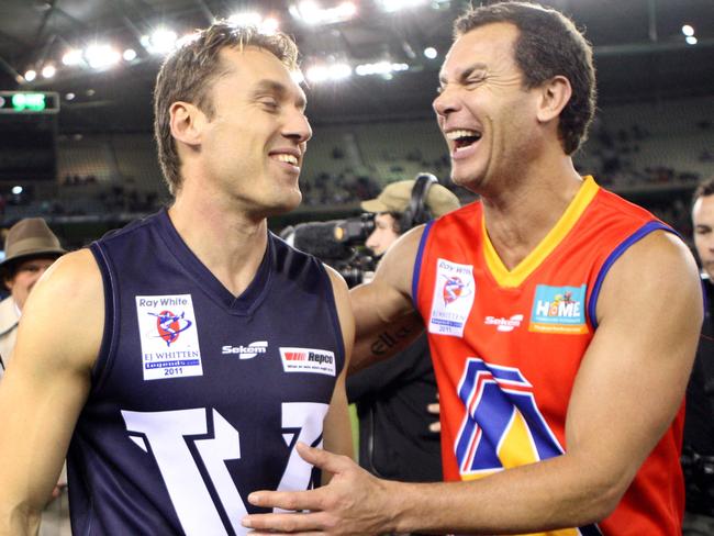 Anthony Koutoufides and Wayne Carey after a EJ Whitten Legends match.