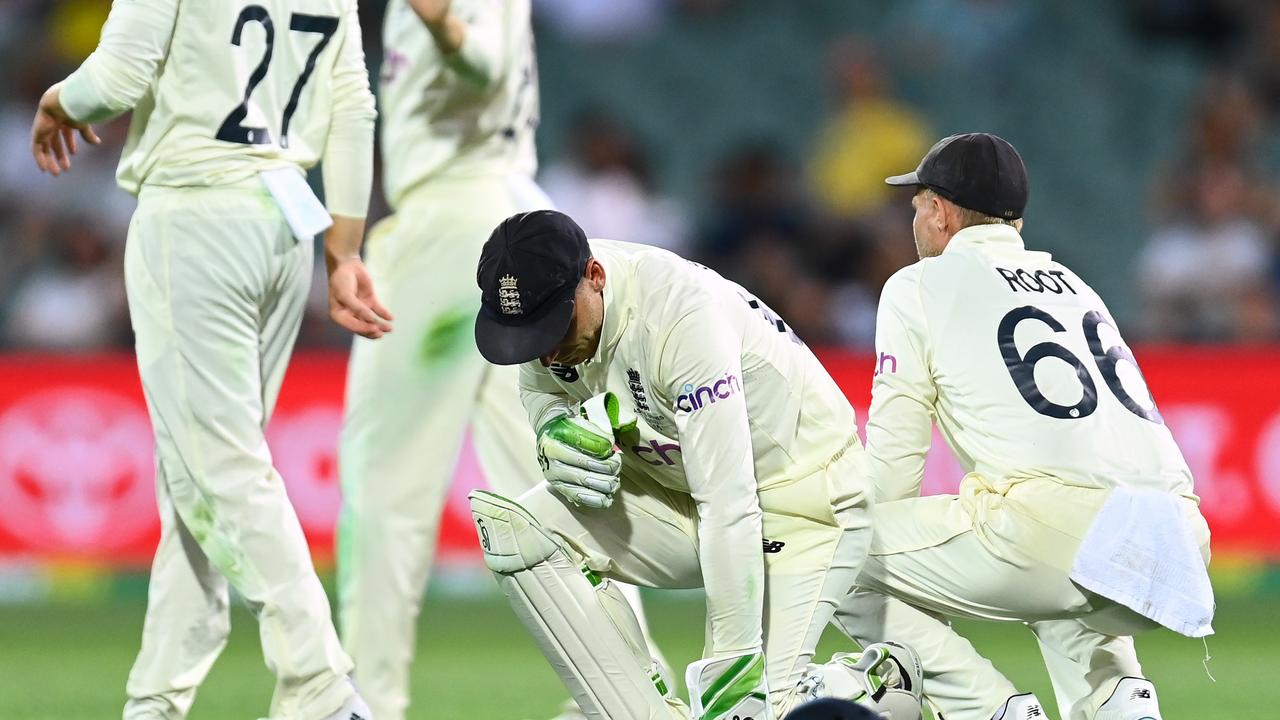 ADELAIDE, AUSTRALIA - DECEMBER 16: Jos Buttler of England reacts after dropping a shot played by Marnus Labuschagne of Australia during day one of the Second Test match in the Ashes series between Australia and England at the Adelaide Oval on December 16, 2021 in Adelaide, Australia. (Photo by Quinn Rooney/Getty Images)