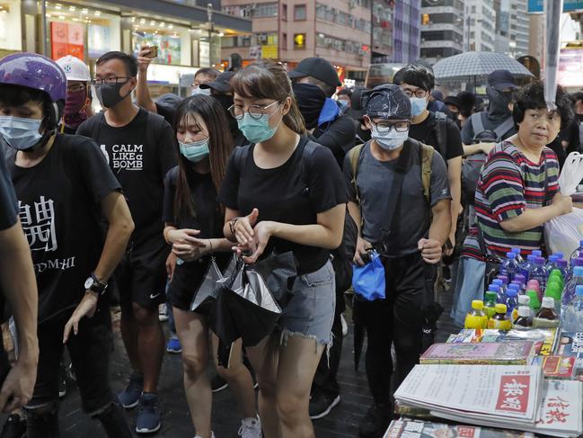 Protesters march during the anti-extradition bill protest in Hong Kong. Picture: AP