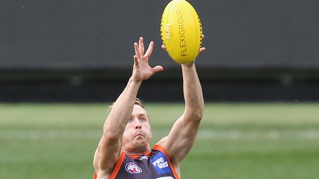 MELBOURNE, AUSTRALIA — SEPTEMBER 22: Devon Smith of the Giants marks the ball during the Greater Western Sydney Giants AFL training session at Melbourne Cricket Ground on September 22, 2017 in Melbourne, Australia. (Photo by Michael Dodge/Getty Images)