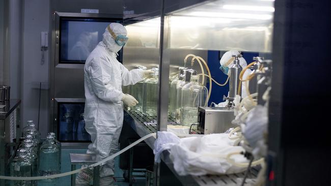 A worker in the Yisheng Biopharma company lab in Shenyang, China, which is also in the race for a vaccine.