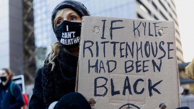 A protester at a "Justice for Rittenhouse Victims-Abolish White Supremacy" protest outside the police precinct centre in Minneapolis. Picture: AFP.