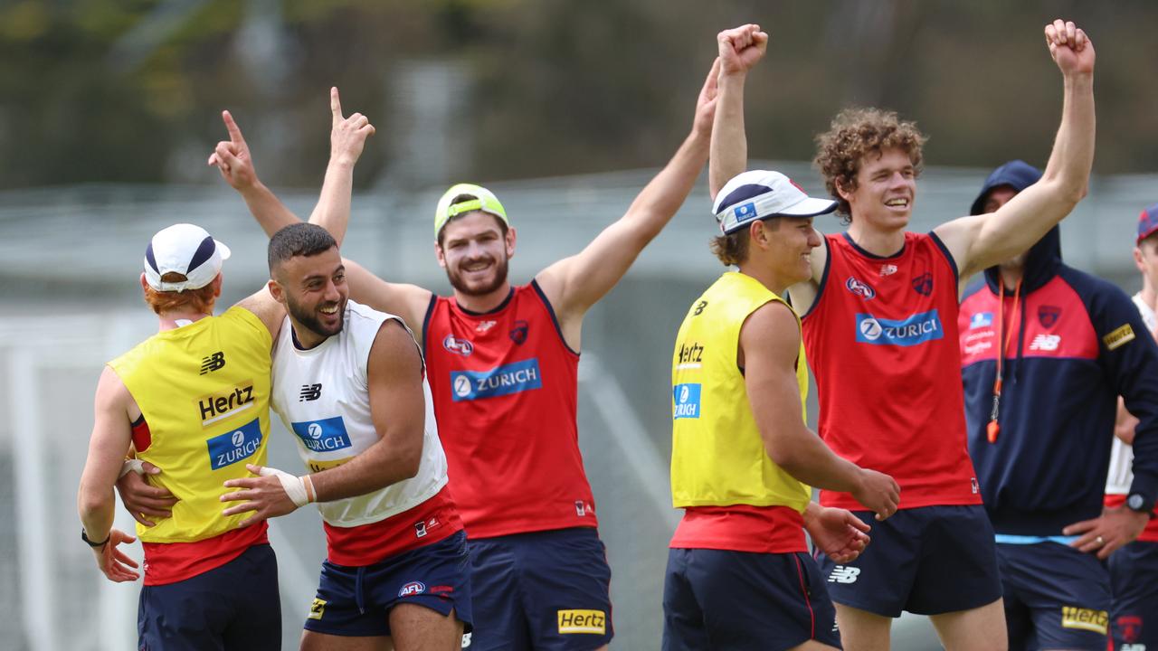 Demons in Lorne: Players enjoying themselves at training. Picture: Brendan Beckett