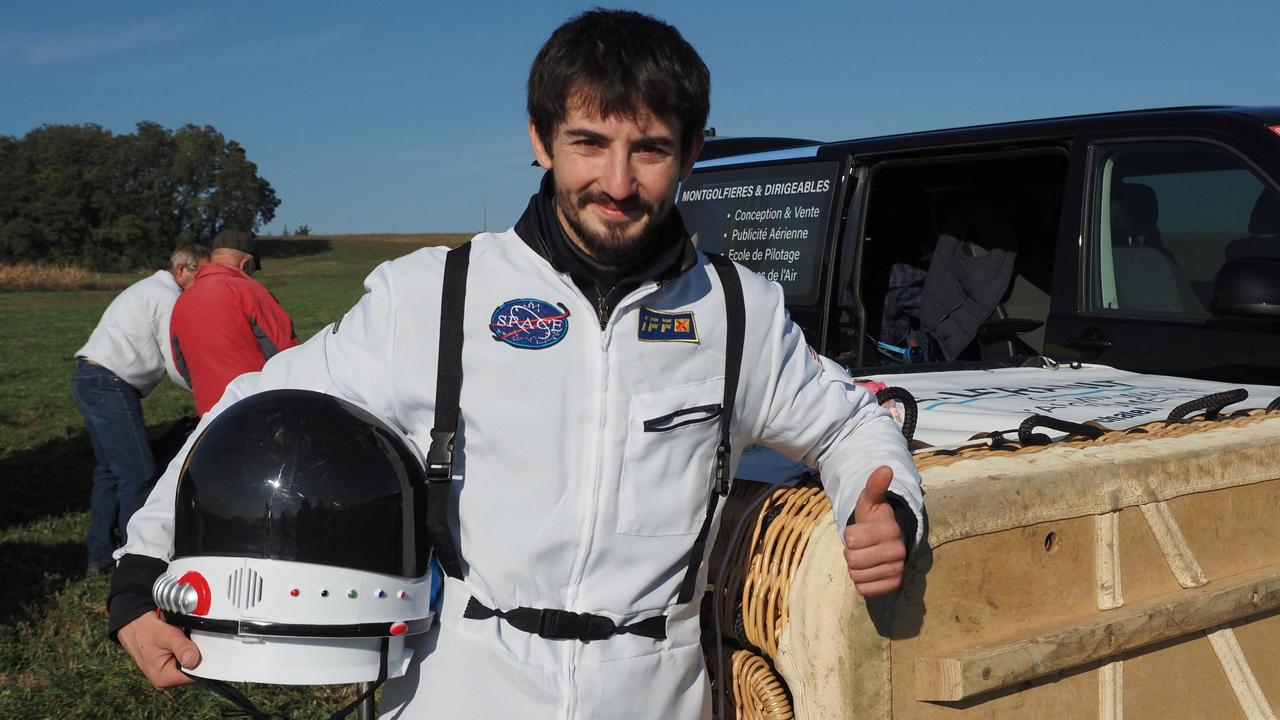 French balloonist Remi Ouvrard poses before setting the world record for standing on top of a hot-air balloon at more than 3637m above the ground in western France. Picture: AFP