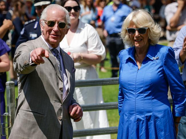 TOPSHOT – Britainâ&#128;&#153;s King Charles III and Queen Camilla view a sheep dog demonstration as they attend the Premier's Community BBQ in Sydney on October 22, 2024. (Photo by Brook Mitchell / POOL / AFP)