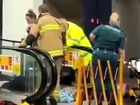 The woman slipped while travelling on the escalator and became trapped. Picture: 9 News