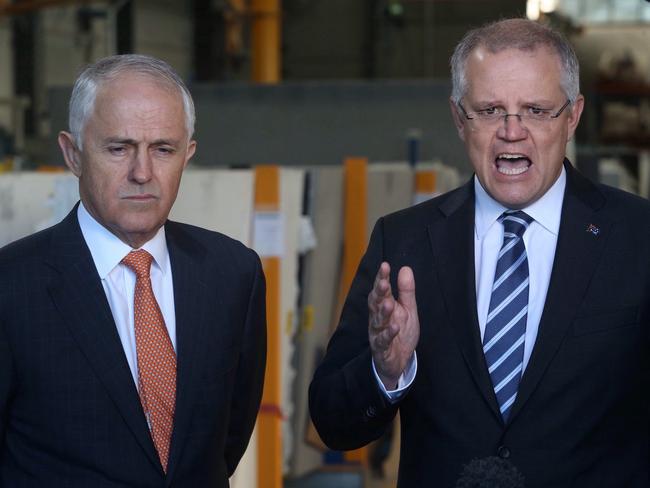 Scott Morrison (right), pictured with Malcolm Turnbull, hasn’t given up on the government’s 10-year business plan. Picture: Gary Ramage