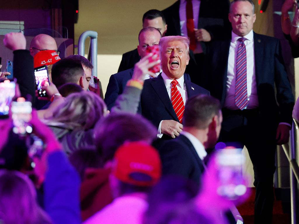 President-Elect Donald Trump walks to the stage at his victory rally at the Capital One Arena. Picture: Getty Images via AFP