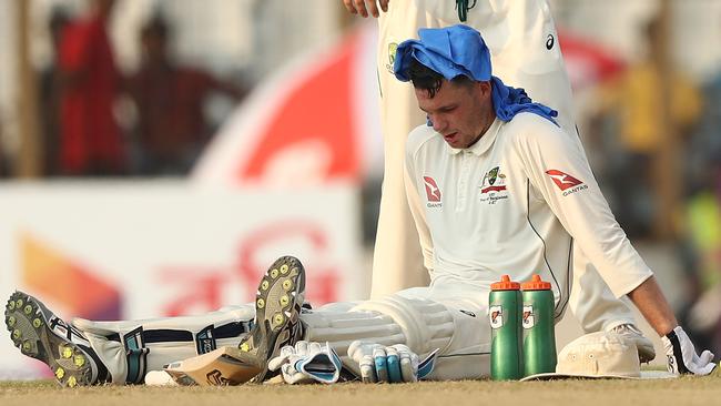 Peter Handscomb struggles badly in the heat on Day 2.
