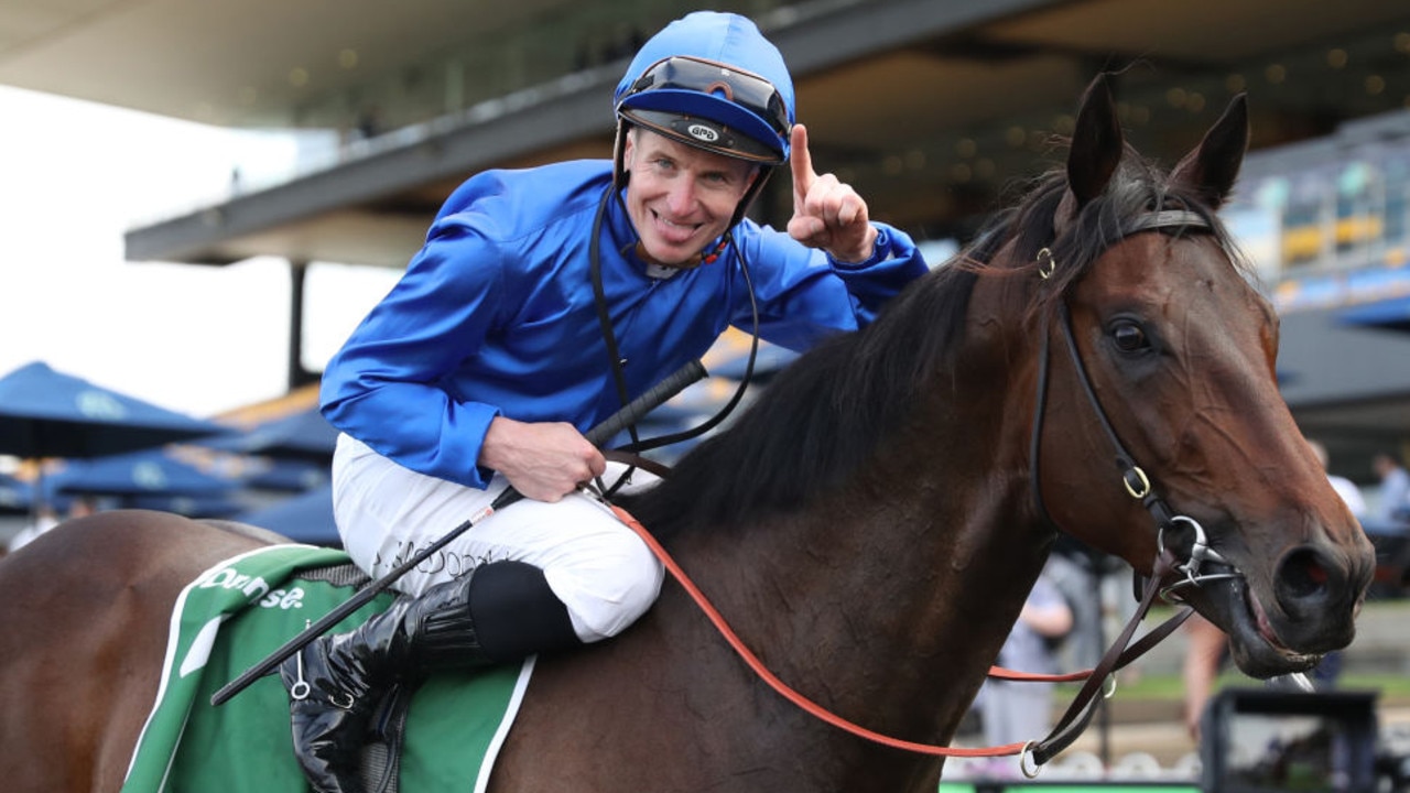 James McDonald celebrates winning his third Golden Rose aboard Broadsiding at Rosehill on Saturday. Photo: Jeremy Ng/Getty Images.