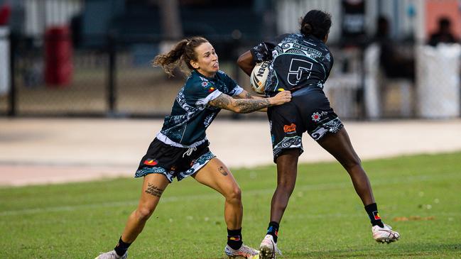 Rhiannon Fecht makes a tackle on Indigenous All Stars player Almareve Ara in the 2023 Deadly Cup Carnival. Picture: Pema Tamang Pakhrin