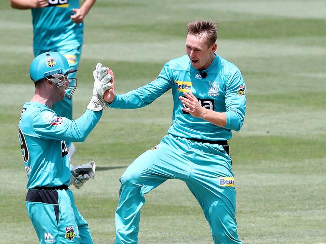 ADELAIDE, AUSTRALIA - JANUARY 26: Marnus Laubuschagne of the Heat celebrates the wicket of Jhye Richardson of the Scorchers with Jimmy Peirson during the Big Bash League match between the Brisbane Heat and Perth Scorchers at Adelaide Oval on January 26, 2021 in Adelaide, Australia. (Photo by Sarah Reed/Getty Images)