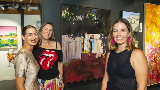 The Next Big Thing 2024 winner was Sydney-based artist Chantelle Stewart (right) with her winning work Life of Reilly and The Toowoomba Gallery owners Niki Hall (left) and Bec Statton, Friday, March 1, 2024. Picture: Kevin Farmer