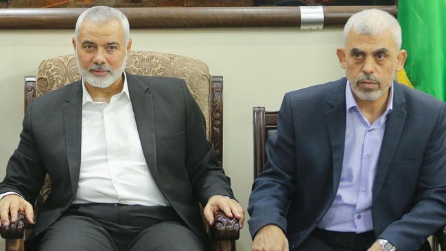 Slain Hamas leaders Ismail Haniyeh (L) and Yahya Sinwar at a meeting in Gaza. Picture; AFP.