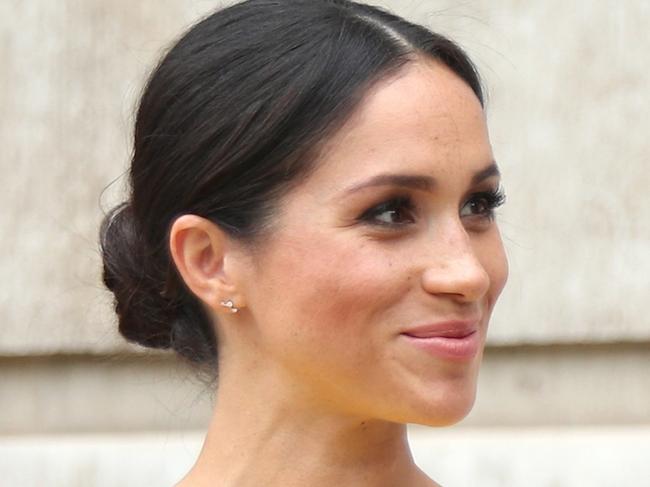 LONDON, ENGLAND - JULY 05:  Prince Harry, Duke of Sussex and Meghan, Duchess of Sussex arrive to meet youngsters from across the Commonwealth as they attend the Your Commonwealth Youth Challenge reception at Marlborough House on July 05, 2018 in London, England. (Photo by Yui Mok - WPA Pool/Getty Images)