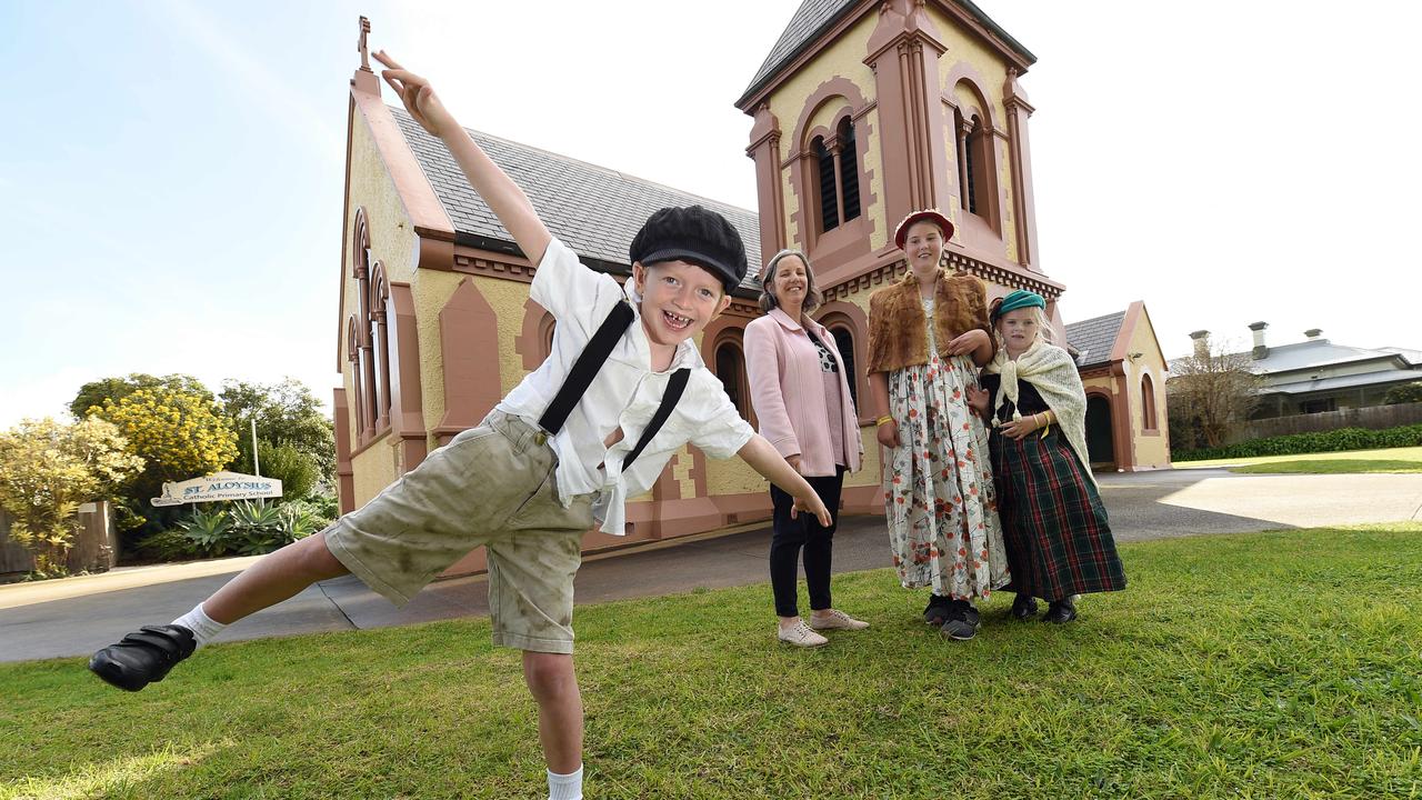 St Aloysius Primary School’s Billy Callahan, Miriam Leahy, Indie and Hazel Birrell celebrate the school’s 120th anniversary by dressing up like the “old days”. Picture: David Smith