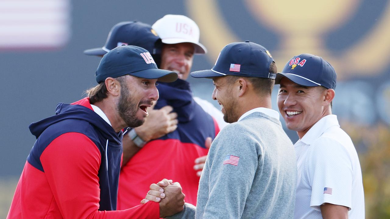 MONTREAL, QUEBEC - SEPTEMBER 26: Max Homa of the U.S. Team celebrates with Xander Schauffele and Collin Morikawa during Thursday's Four-ball matches on day one of the 2024 Presidents Cup at The Royal Montreal Golf Club on September 26, 2024 in Montreal, Quebec, Canada. (Photo by Harry How/Getty Images)