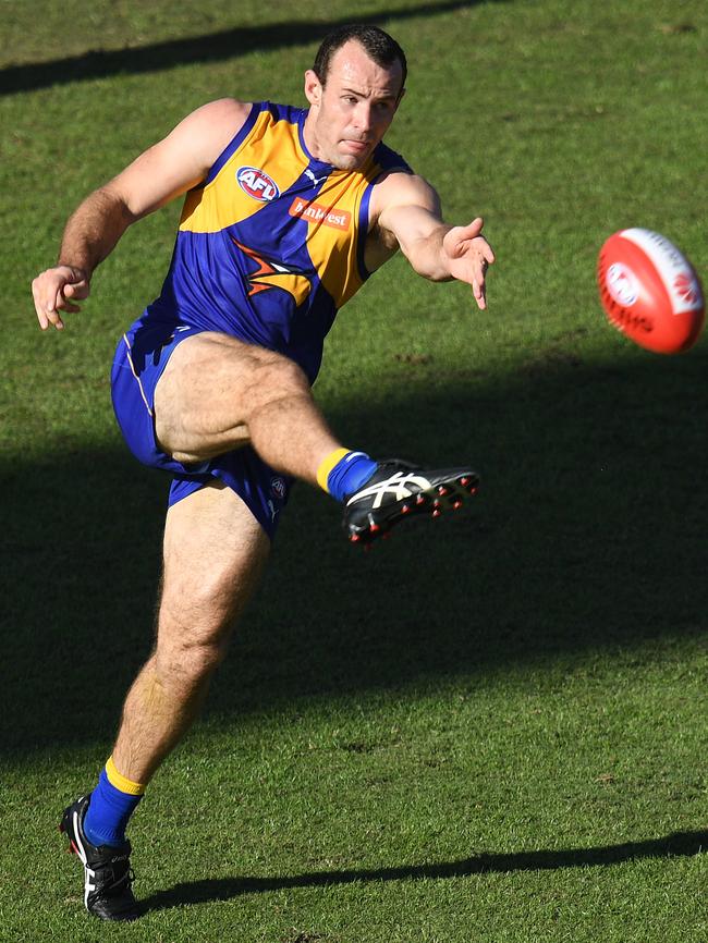 Shannon Hurn launches into a big roost at Metricon Stadium — exactly what he didn’t do in the final minute.