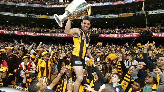 Brent Guerra with the 2013 premiership cup, the first of Hawthorn’s three-peat. Picture: Michael Klein