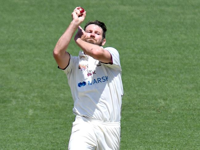 Michael Neser bowls for Queensland during their Shield clash with NSW. Picture: Bradley Kanaris/Getty Images