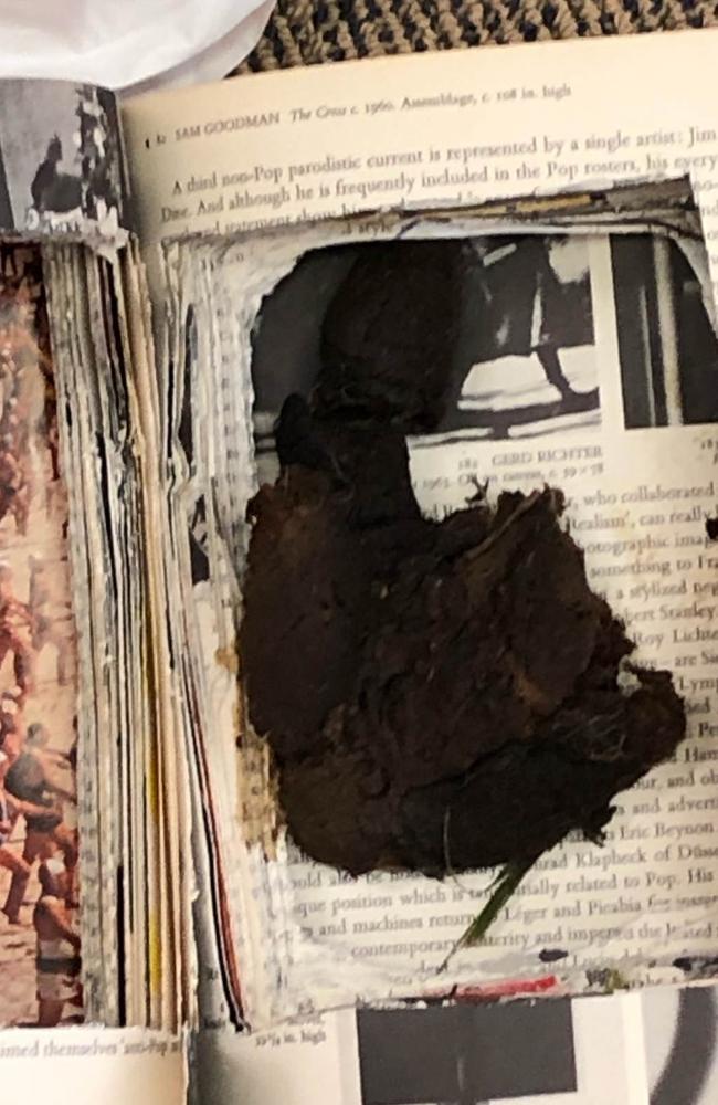 Tony Abbott has woken to find a book filled with poo dumped on the doorstep of his Manly office overnight. Picture: Supplied