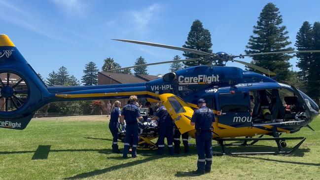 A medical team from the CareFlight rescue helicopter flew a boy, 15, to the Sydney Children's Hospital Randwick after he was pulled unconscious from the surf and resuscitated by lifeguards at Mona Vale Beach on Wednesday. Picture: CareFlight.