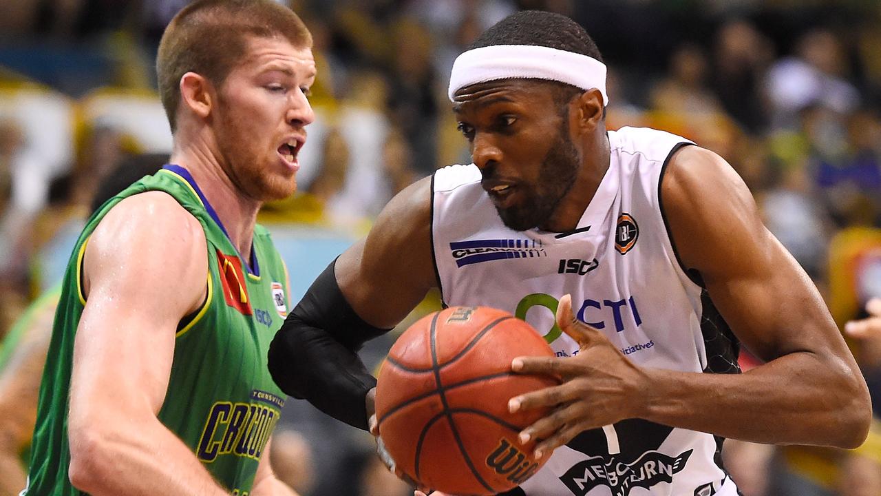 TOWNSVILLE, AUSTRALIA - NOVEMBER 26: Hakim Warrick of Melbourne United drives to the basket past Brian Conklin of the Crocodiles during the round eight NBL match between the Townsville Crocodiles and Melbourne United on November 26, 2015 in Townsville, Australia. (Photo by Ian Hitchcock/Getty Images)