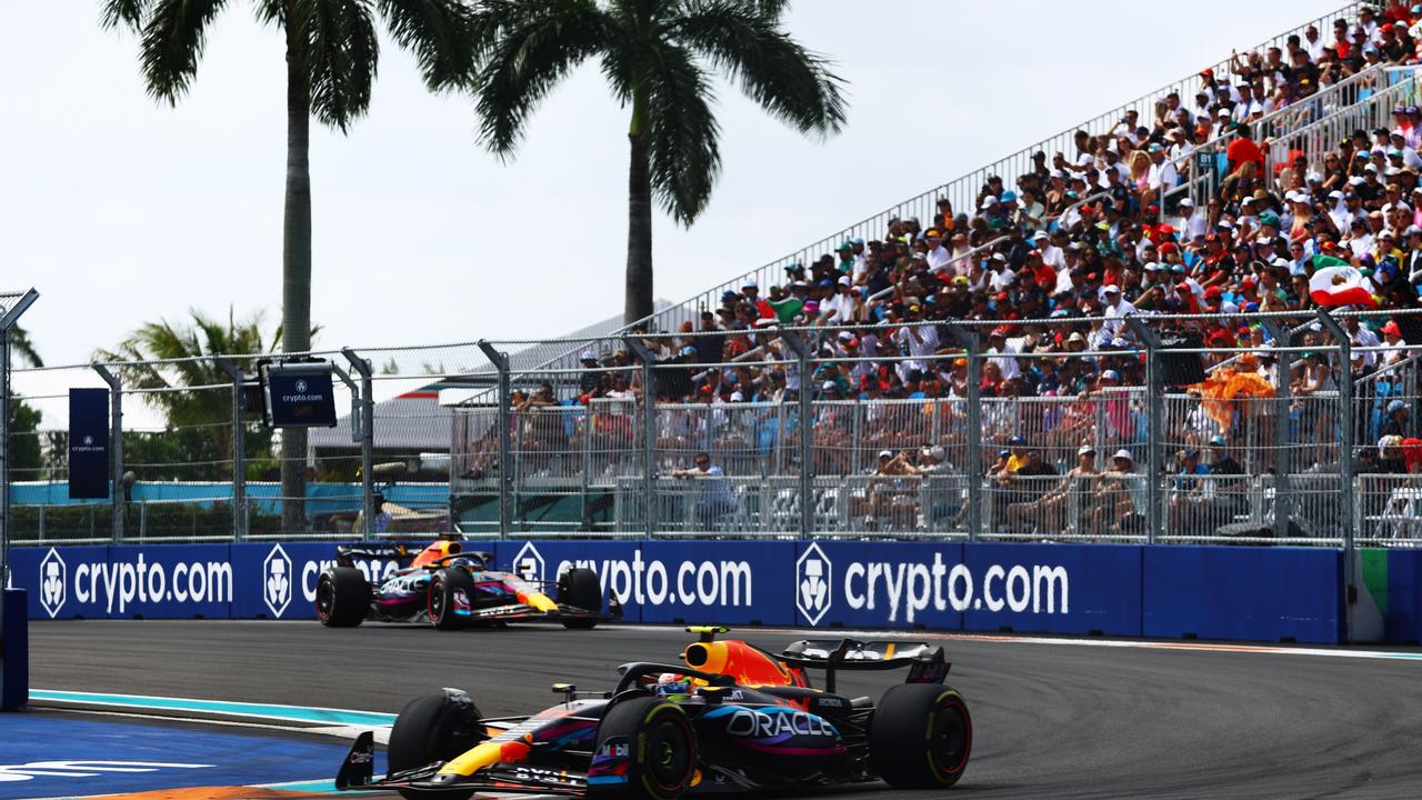 MIAMI, FLORIDA - MAY 07: Sergio Perez of Mexico driving the (11) Oracle Red Bull Racing RB19 leads Max Verstappen of the Netherlands driving the (1) Oracle Red Bull Racing RB19 during the F1 Grand Prix of Miami at Miami International Autodrome on May 07, 2023 in Miami, Florida. (Photo by Mark Thompson/Getty Images)