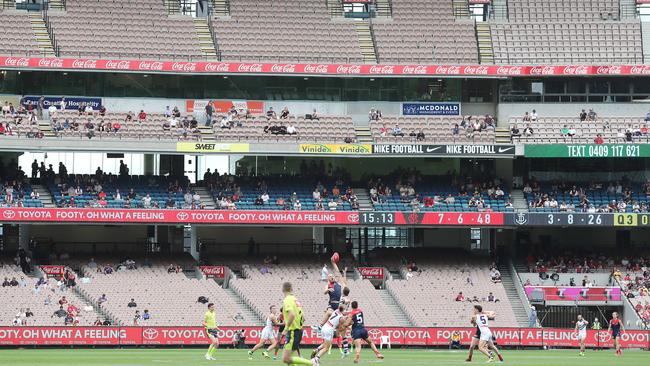 A very small crowd turned out to watch Melbourne v Fremantle at the MCG. Picture: Michael Klein