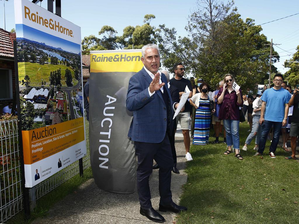 Tom Panos in his role as auctioneer presides over an Auction at 4 Curtin Avenue, Abbotsford. Picture: John Appleyard