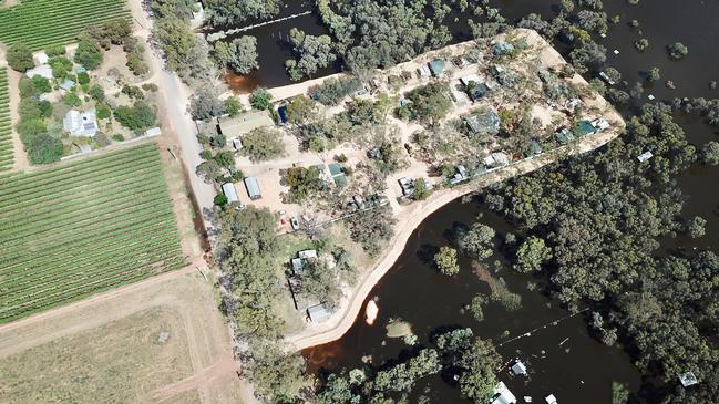 The levee holds back the water at Kingston On Murray Caravan Park in December, 2022. Picture: Supplied