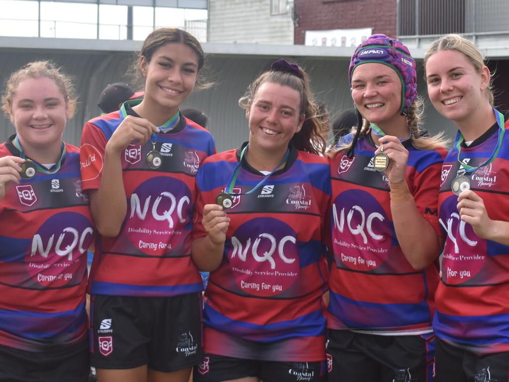 Hannah Dedauntan, Ana Malupo, Courtney Reynolds, Xanthe Topping, and Zoe Aitken celebrating Coastal Neurs' triumph at the Mackay Indigenous Rugby League Carnival. Picture: Mitch Bourke