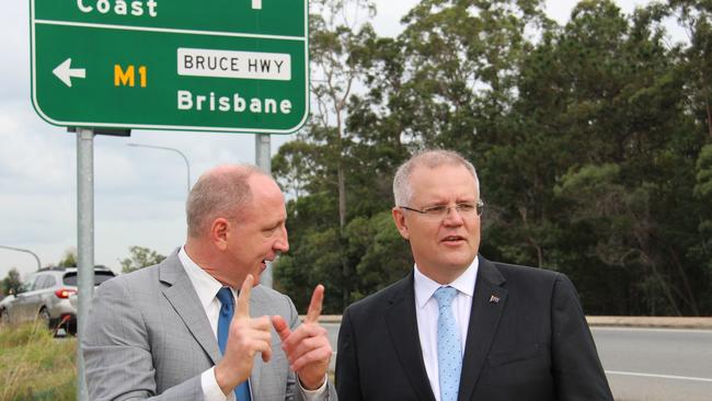 Federal LNP MP for Petrie Luke Howarth discusses the upgrade to the Deception Bay Rd interchange with Federal Treasurer Scott Morrison. Photo: Erin Smith