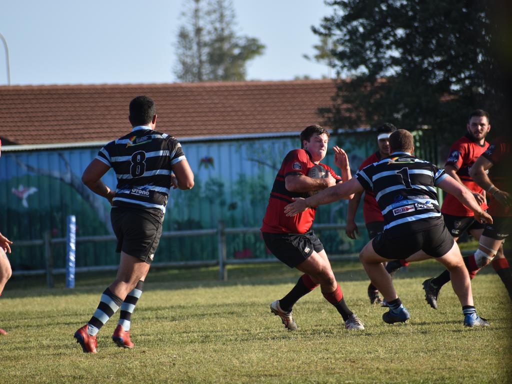 Ballina Seahorses Sam Pearce tries to lay a tackle