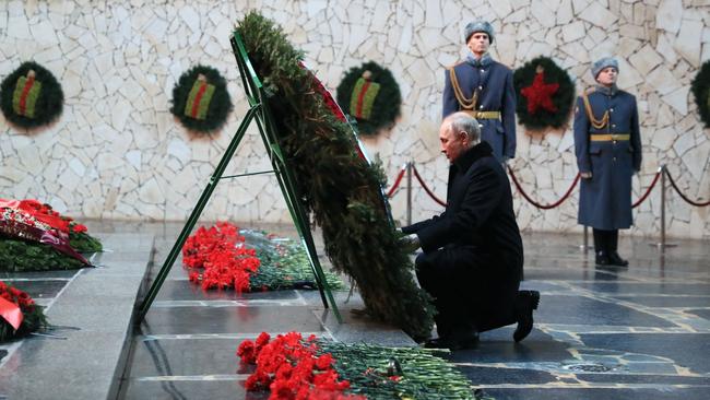 Vladimir Putin lays a wreath at Mamayev Kurgan memorial in Volgograd on Thursday. Picture: AFP