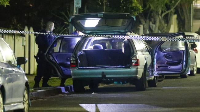 Police spend hours after the arrested going over a car parked in Barker St, Randwick. Steve Tyson