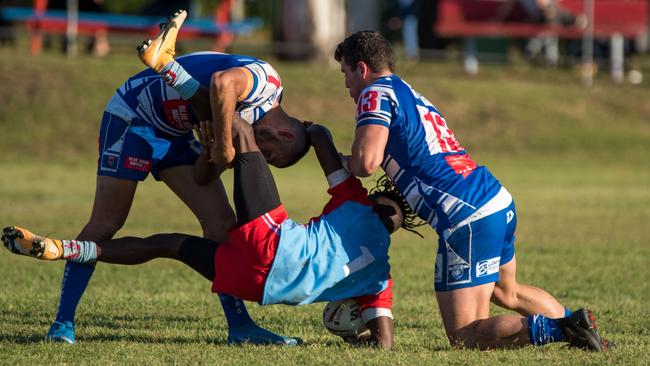 Swifts fullback Godfrey Okot is tackled by the Brothers defence including Lachlan Vellacott in the Rugby League Ipswich A-Grade match at Purga. Picture: Bruce Clayton