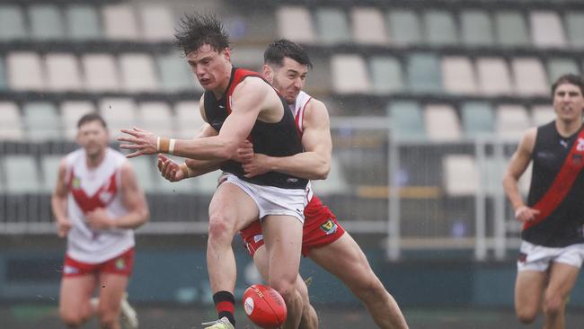 Tom Cleary (back) returns to Old Scholars club University after a year at Clarence but will return as senior coach next season. Picture: Nikki Davis-Jones