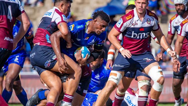 SUVA, FIJI - MAY 03: Mesake Vocevoce of Drua runs with the ball to score a try during the round 12 Super Rugby Pacific match between Fijian Drua and Queensland Reds at HFC Stadium, on May 03, 2025, in Suva, Fiji. (Photo by Pita Simpson/Getty Images)