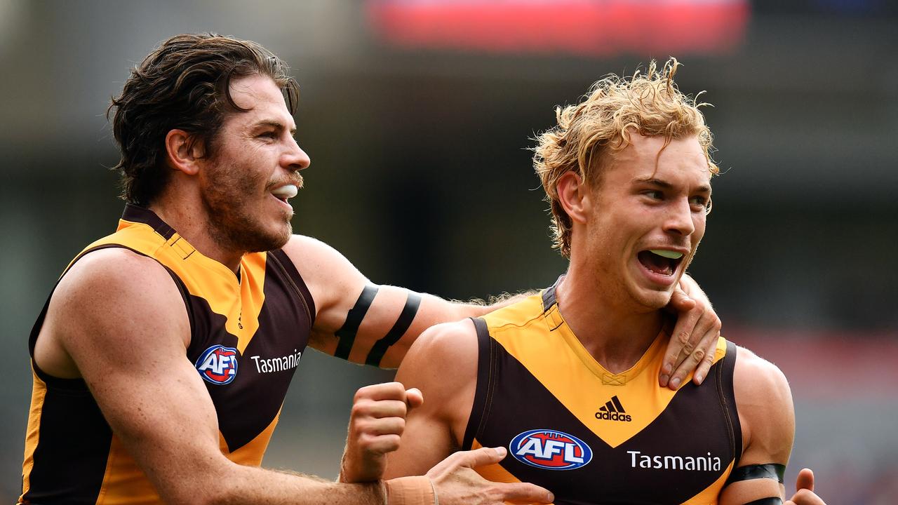 Isaac Smith and James Worpel celebrate a goal in 2019.