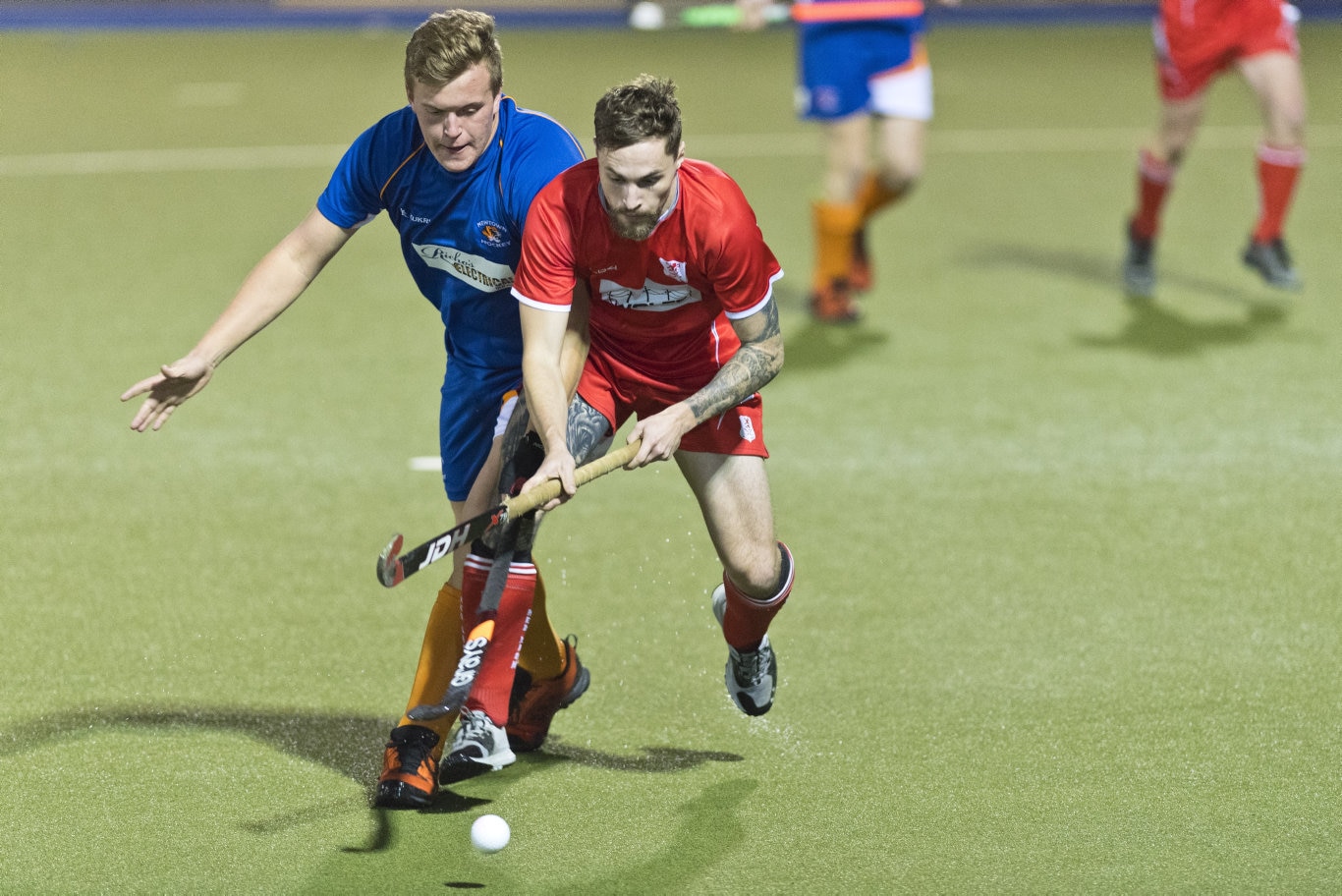 Ashley Ziviani (left) of Newtown and Bradley Hobday of Red Lion in Toowoomba Hockey COVID Cup men round four at Clyde Park, Friday, July 31, 2020. Picture: Kevin Farmer