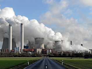 Steam rises from a coal-fired power plant. Picture: SASCHA STEINBACH