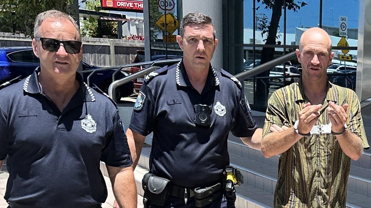 The Yandina man (far right) with police on their way to the watch-house. Picture: Sam Turner