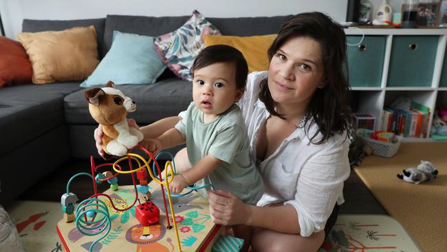 We’re trying to cut costs everywhere we can,’ says Wollongong nurse Sarah Morton, with her 11-month-old child, Freddie. Picture: John Feder