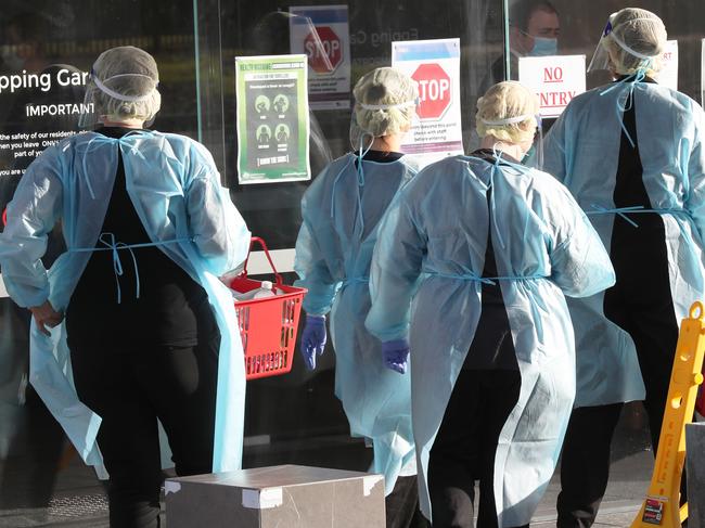 MELBOURNE, AUSTRALIA - NewsWire Photos JULY 30, 2020: Aged care workers arrive at Epping Gardens Aged Care home which has a COVID-19 breakout. Picture: NCA NewsWire /David Crosling