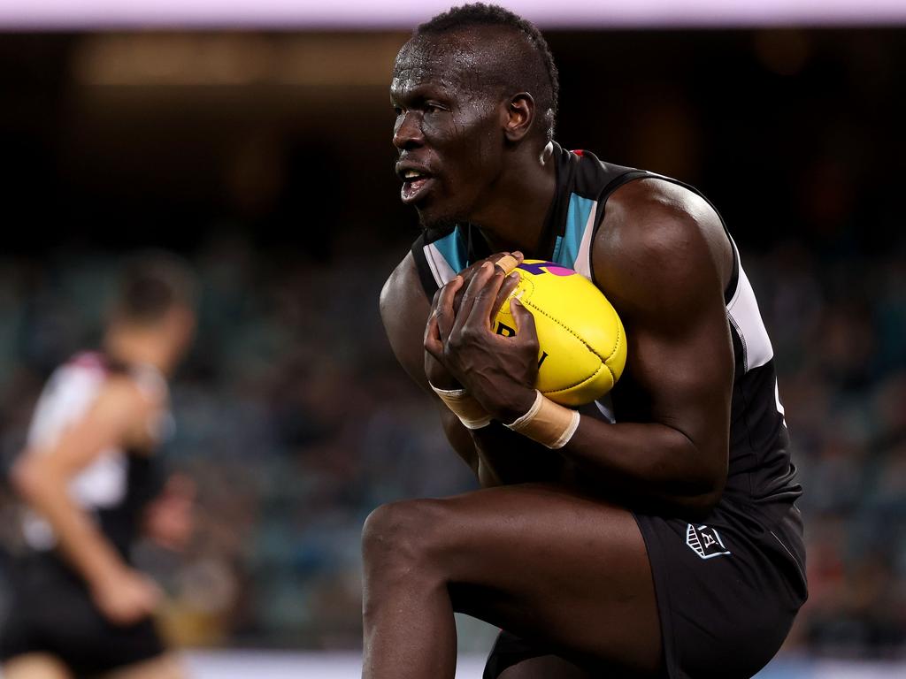 Memo to the Dogs: Don’t repeat Geelong’s mistake of kicking it to Aliir Aliir’s space. Picture: AFL Photos/Getty Images