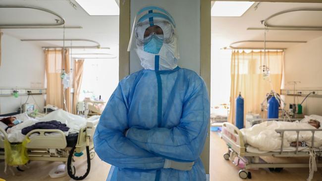 A medical staff member resting at the isolation ward of the Wuhan Red Cross Hospital in Wuhan in China's central Hubei province.