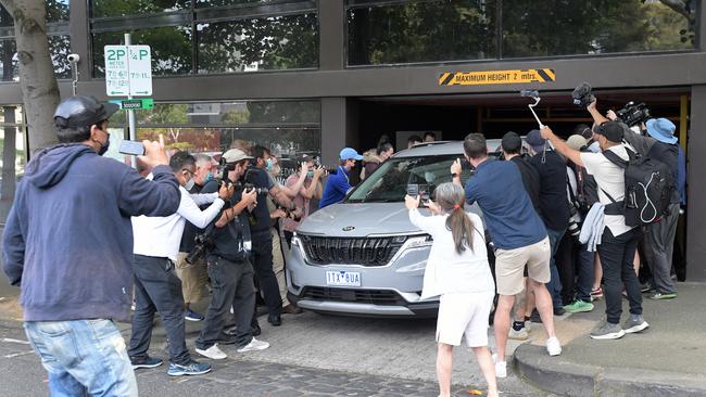 Media and fans surround Djokovic’s car as it leaves an immigration hotel in Melbourne in 2022. Picture: AAP